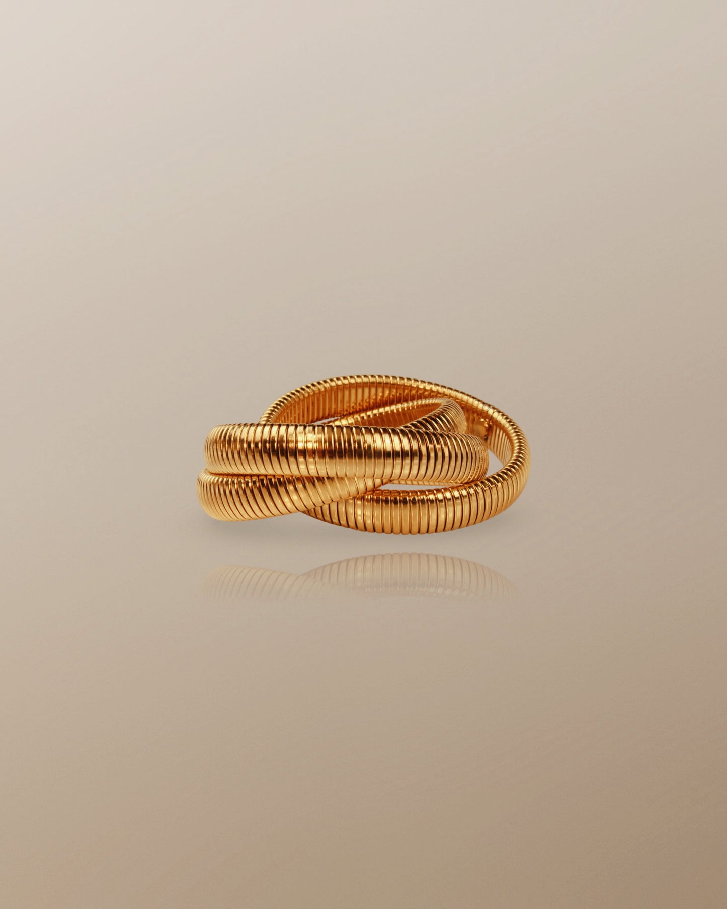 The Sanyu Bold Triple Layer Bangle in 18K Gold