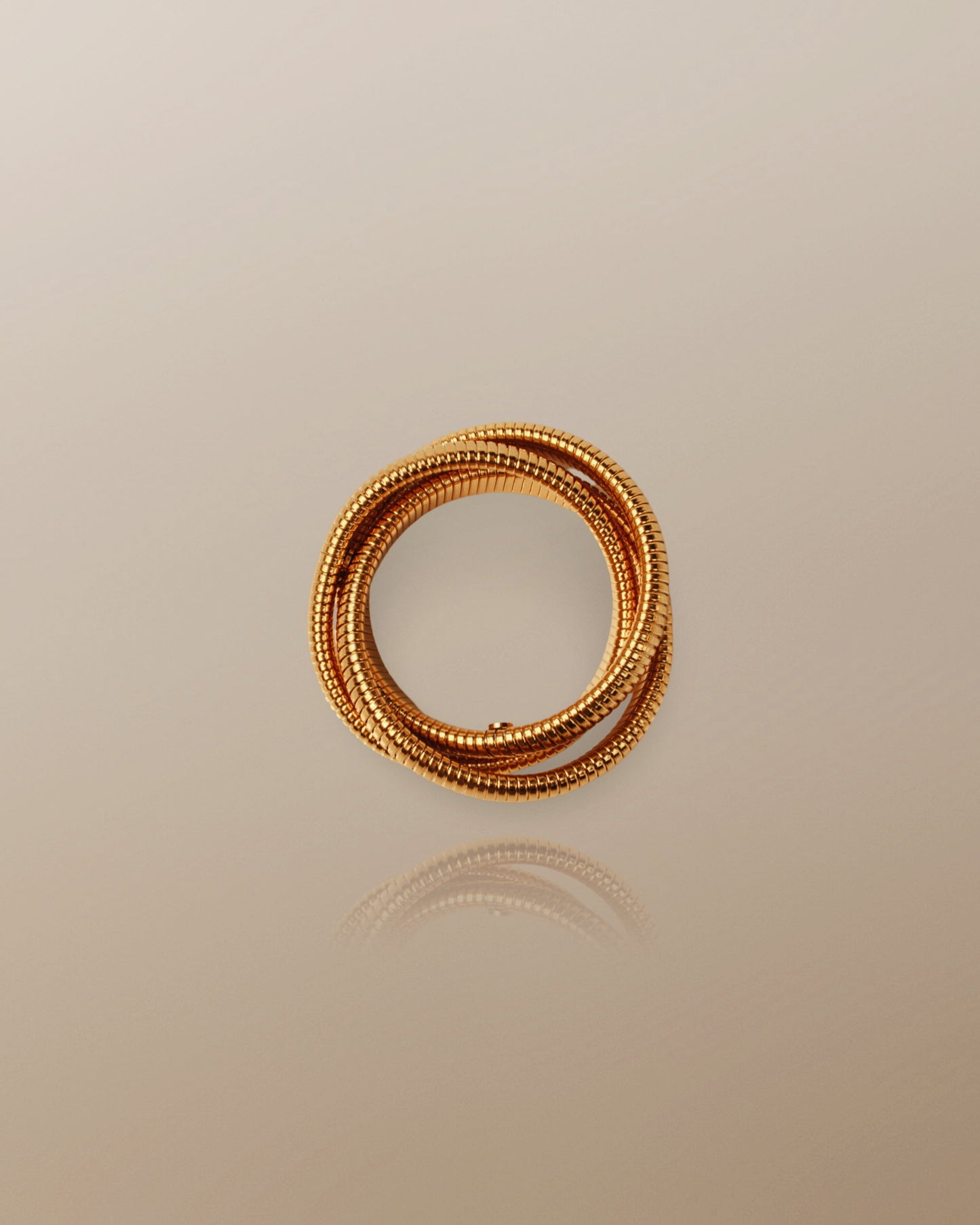 The Sanyu Bold Triple Layer Bangle in 18K Gold