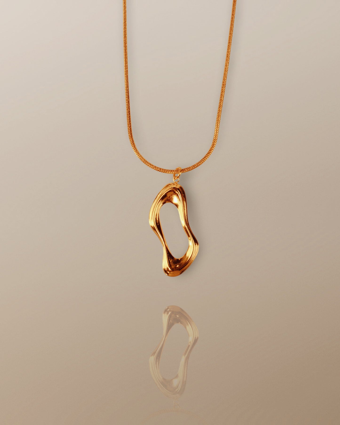The Orla Abstract Pendant Necklace in 18K Gold