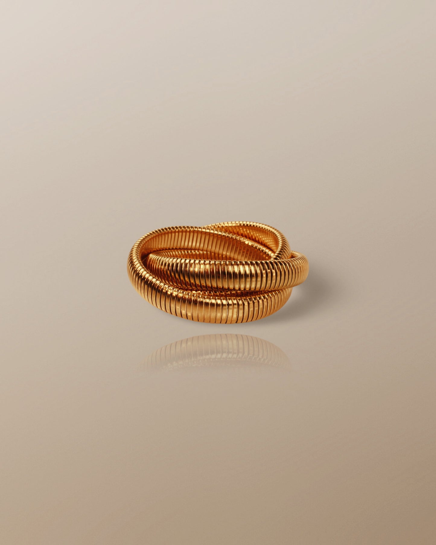 The Sanyu Bold Triple Layer Bangle in 18K Gold