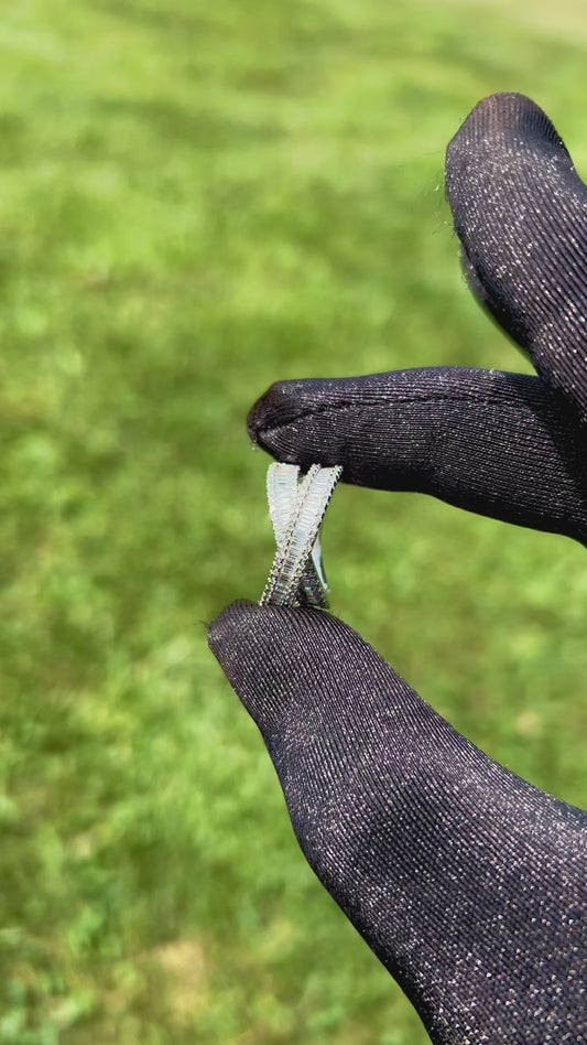 The Liora Crossover Baguette Ring in 925 Sterling Silver